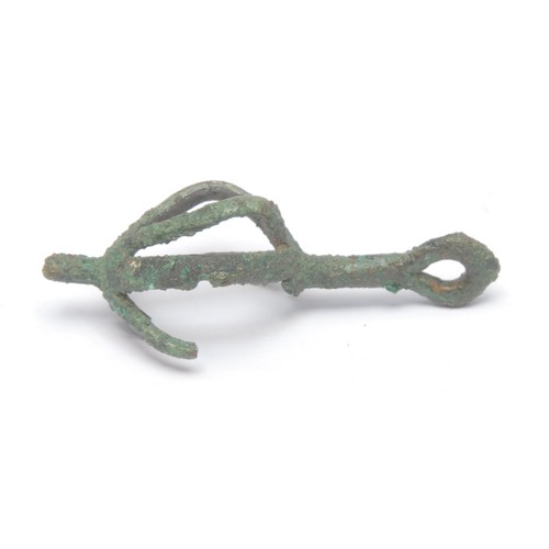 185 - Antiquities - an Iranian Luristan copper openwork fruit cage bell, 5cm long