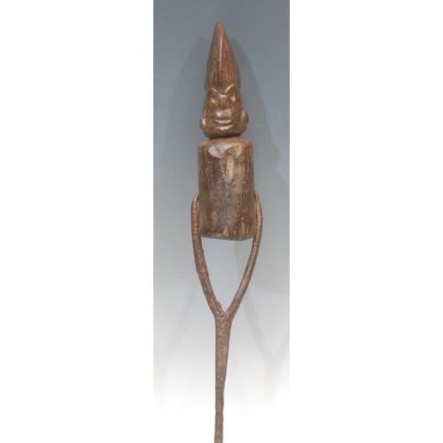 98 - Tribal Art - an African hardwood figurative funerary or boundary marker, as a tribesman, the head ca... 