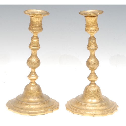 989 - Henri Picard (1840-1890), manner of, a pair of French gilt bronze candlesticks, the removable drip t... 