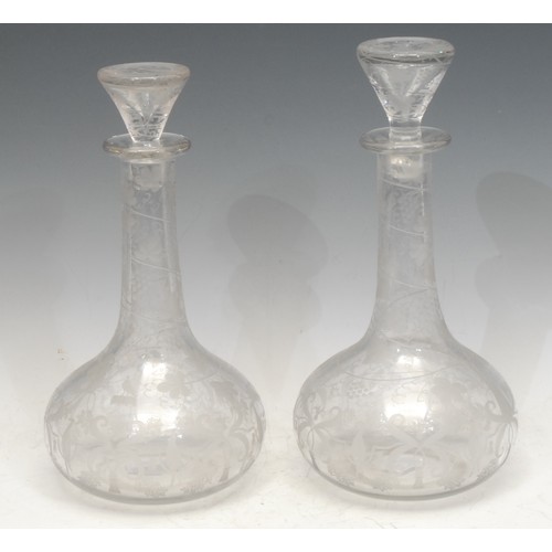 1004 - Glassware - a pair of 19th century French decanters, of squat ovoid form, etched with exotic birds a... 