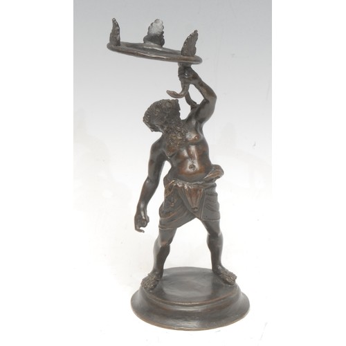 978 - A Grand Tour patinated bronze candleholder, of Silenus, after the Pompeian, 16cm high overall, c. 19... 