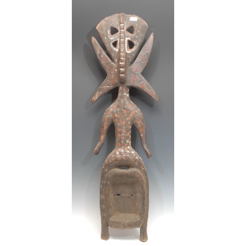 99 - Tribal Art - an African hardwood reliquary guardian figure (mbulu ngulu), of a spiritual elder above... 