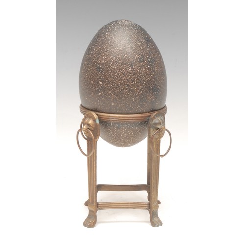 142 - Natural History - an emu egg specimen, mounted for display on an Empire style bronze stand, comprisi... 