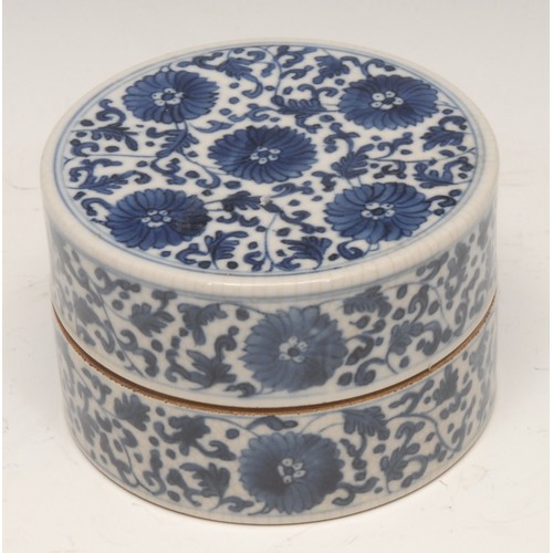 999 - Ceramics - a late 19th century Chinese bonbonniere or stacking box, painted throughout with chrysant... 