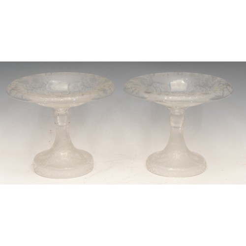 1003 - Glassware - a pair of 19th century French crystal tazzas, the bowls etched with alternating panels o... 