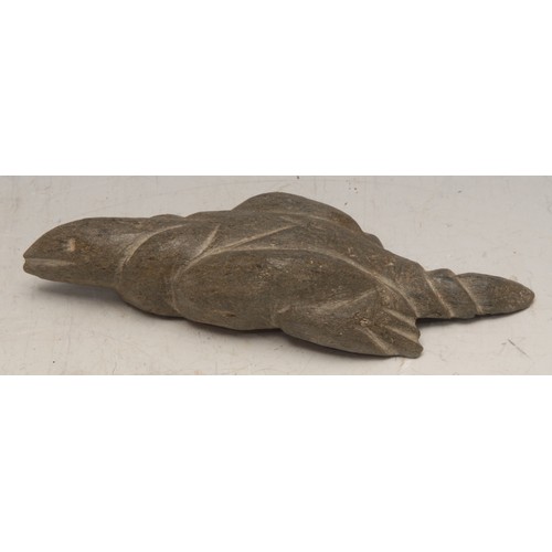 111 - An Inuit stone carving, of a stylised bird, 14cm long