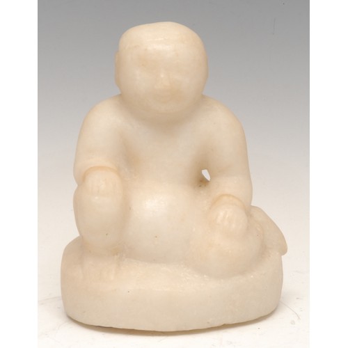 192 - A Chinese hardstone sculpture, carved as a seated Buddha, 16cm high overall, Qing Dynasty