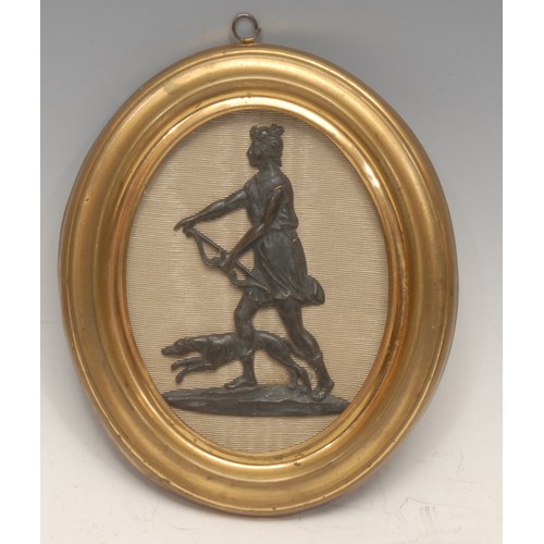 262 - A Victorian bronze plaque, of Diana the Huntress, brass oval frame, 16cm x 13.5cm