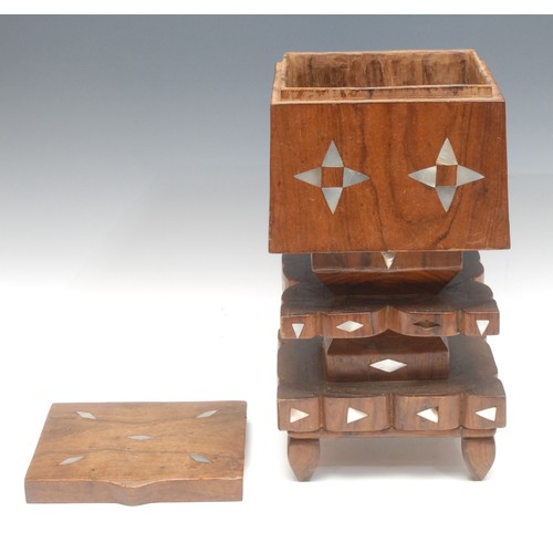 74 - Tribal Art - a Polynesian hardwood rectangular treasure box, of stepped geometric 'totem' form, inla... 