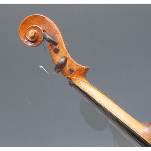 210 - A violin, the two-piece back 36.5cm long excluding button, rosewood tuning pegs, paper label printed... 