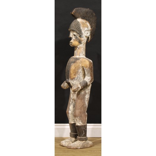 48 - Tribal Art - a large Teke male figure, elaborate coiffure with central ridge, scarified forehead and... 