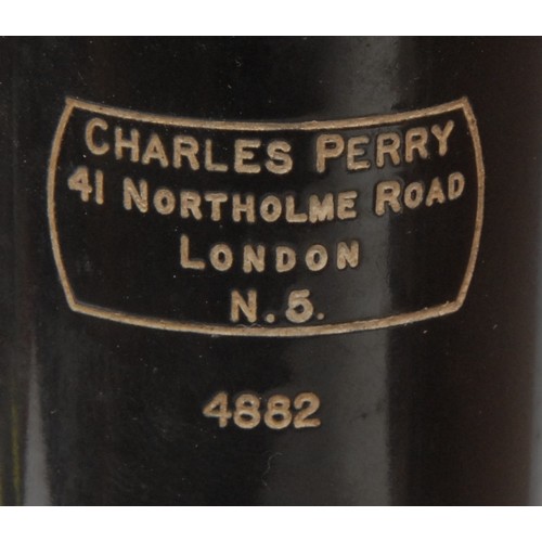 213 - A black painted and lacquered brass monocular microscope, by Charles Perry, London, no.4882, rack an... 