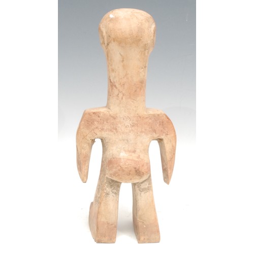 27 - Tribal Art - a Ewe figure, highly stylised features, traces of red surface decoration, 27cm high, To... 