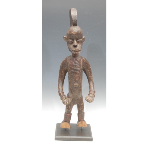 96 - Tribal Art - an Afo figure, he stands, with elavborate coiffure, picked out with traces of red pigme... 