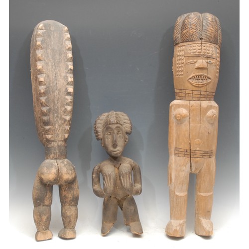 12 - Tribal Art - a Baule maternity figure, 38cm high, Ivory Coast; other figures, larger (3)