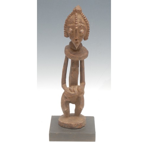 23 - Tribal Art - a Dogon figure, depicting mother and child, 30cm high, Mali, West Africa, the collector... 