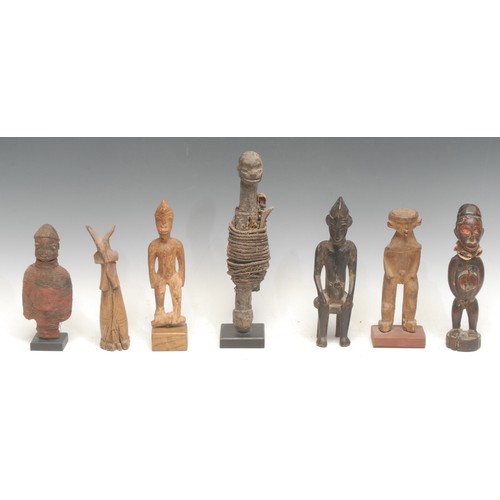 30 - Tribal Art - a Fon fetish figure, of typical abstract stylised form, cord-bound, 26.5cm high, Benin;... 