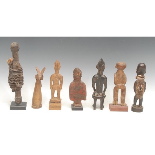 30 - Tribal Art - a Fon fetish figure, of typical abstract stylised form, cord-bound, 26.5cm high, Benin;... 