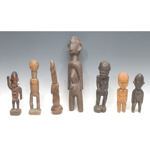 42 - Tribal Art - a Kuba figure, 24.5cm high, Zaire; others, various (7)