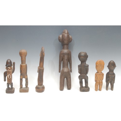 42 - Tribal Art - a Kuba figure, 24.5cm high, Zaire; others, various (7)