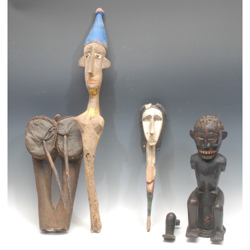 103 - Tribal Art - an Ekoi headdress figure, in Ejagham style, 41cm high, Nigeria; etc (4)