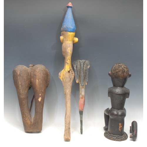 103 - Tribal Art - an Ekoi headdress figure, in Ejagham style, 41cm high, Nigeria; etc (4)