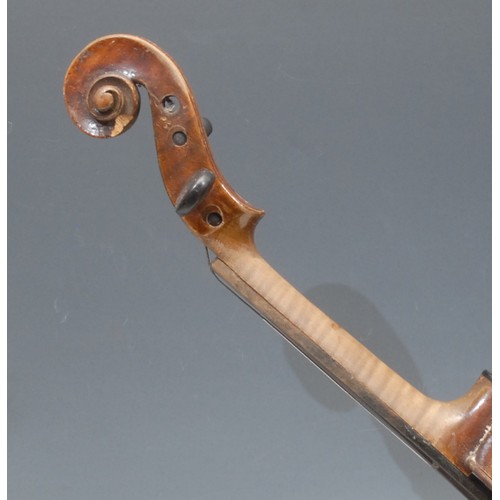 206 - A violin, the one piece back 35.5cm long excluding button, paper label printed Johann George Lippold... 