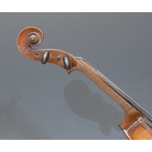 206 - A violin, the one piece back 35.5cm long excluding button, paper label printed Johann George Lippold... 