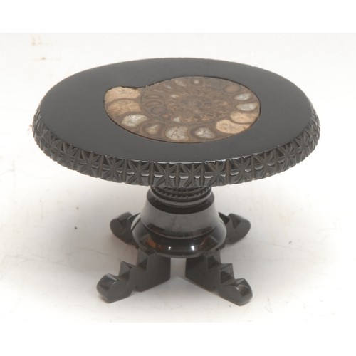 A 19th century Whitby jet miniature pedestal table, the oval top inlaid ...