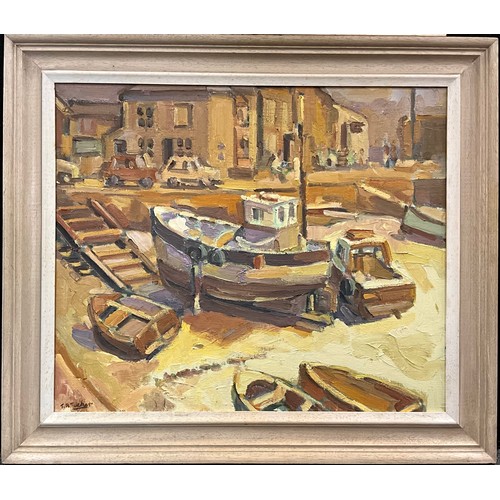 1145 - Trevor Tucker (Cornish School, 20th century), Boats at Low Tide, Mevagissey, Cornwall, signed, oil o... 