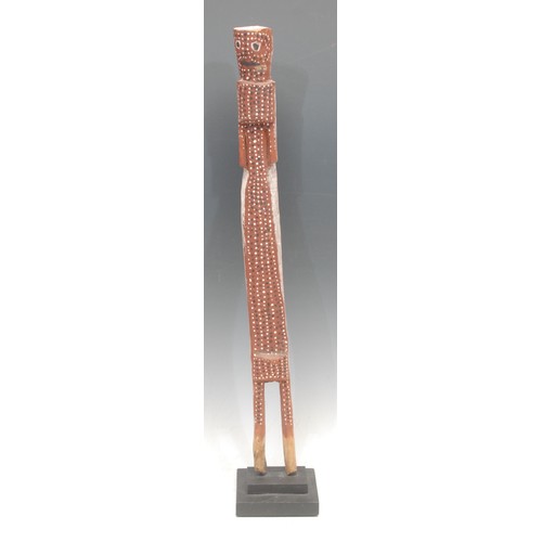 61 - Tribal Art - a Metoko Lengola figure, typically elongated and highly stylised, boldly decorated with... 