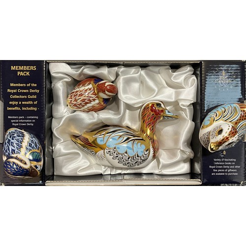 5018 - A set of two Royal Crown Derby paperweights, Duck and Duckling, Collectors Guild exclusive, printed ... 