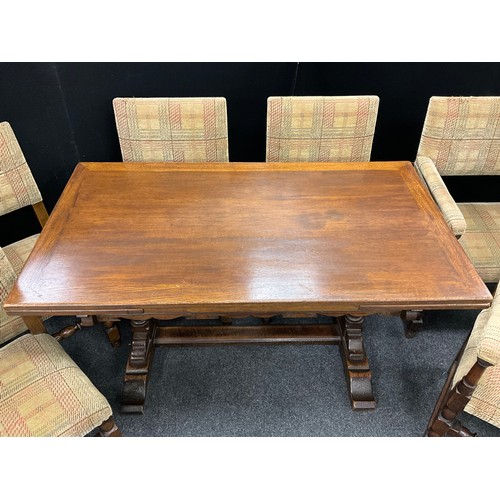 40 - A Jacobean revival carved oak draw leaf dining table, and set of six Titchmarsh and Goodwin style up... 