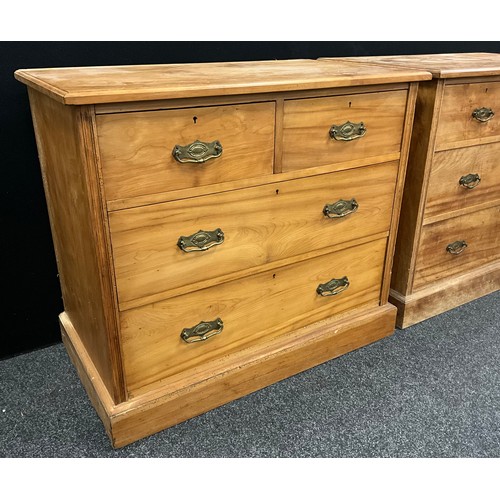 52 - A Pair of Edwardian satinwood chests of drawers, each with two short, over two long drawers, (brass ... 