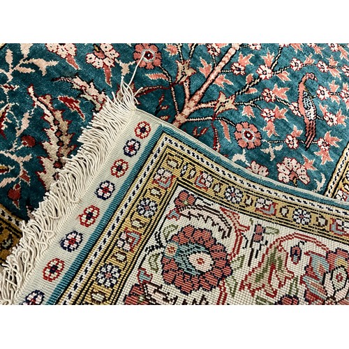 53 - A Turkish Kelsarie silk rug / carpet, hand-knotted with ‘Tree of Life’, design, in Turquoise blue, s... 