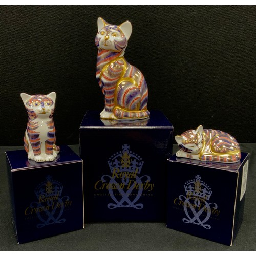 68 - Royal Crown Derby paperweights including; Cat, Kitten, Sleeping kitten, all gold stoppers, all boxed... 