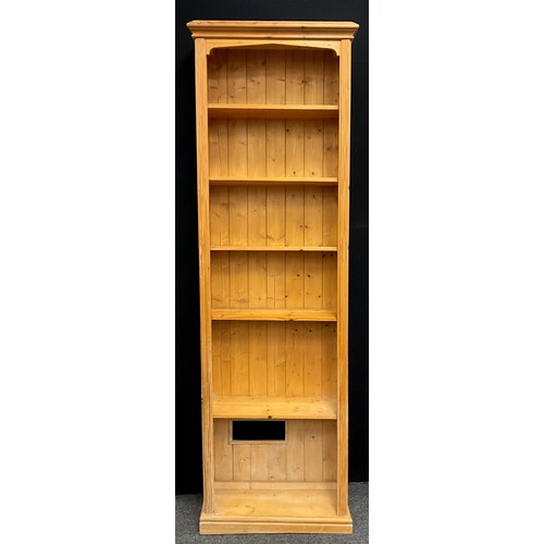 74 - A tall pine open bookcase, six shelves, 217cm high x 64cm wide x 24.5cm deep.