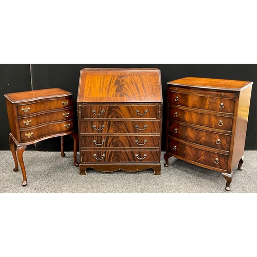 77 - Furniture - a George III revival inverted serpentine front mahogany side cabinet, having three short... 