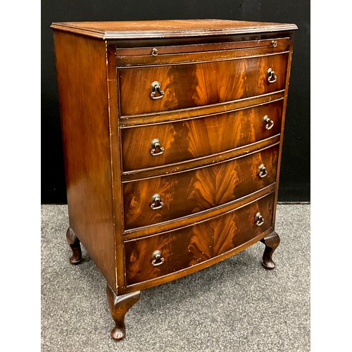 77 - Furniture - a George III revival inverted serpentine front mahogany side cabinet, having three short... 