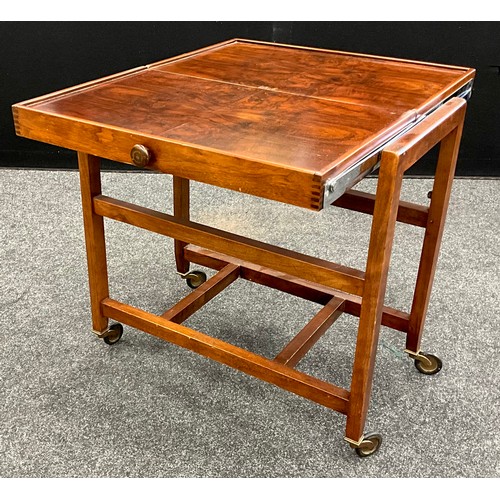 85 - A mid century metamorphic walnut hostess trolley / table, 87.5cm high x 68.5cm x 38cm.