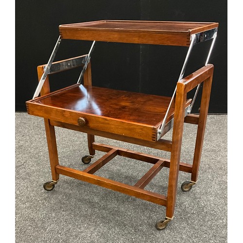 85 - A mid century metamorphic walnut hostess trolley / table, 87.5cm high x 68.5cm x 38cm.