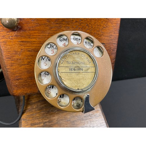 89 - An early 20th century mahogany cased wall mounted telephone.