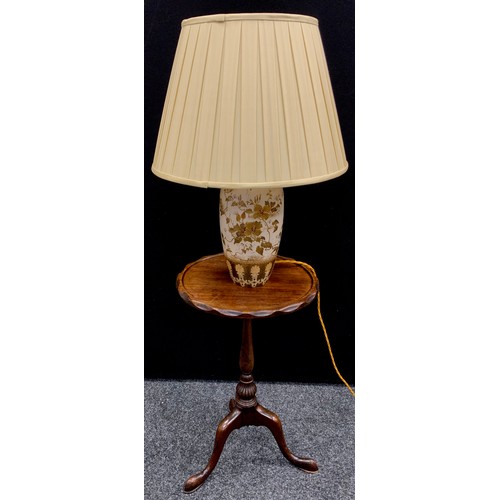 90 - A Doulton Burslem vase, converted into lamp with shade, 32cm high; 20th century maghogany wine table... 