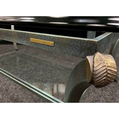 78A - Interior design - furniture - A Pierre Vandel, of Paris, ‘Vert-de-gris’ metal, and glass, coffee tab... 