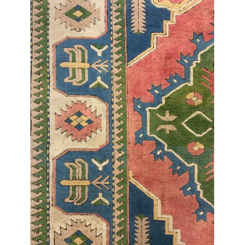 178 - A Turkish woollen rug, 233cm x 180cm; another smaller rug, 158cm x 83cm, (2).