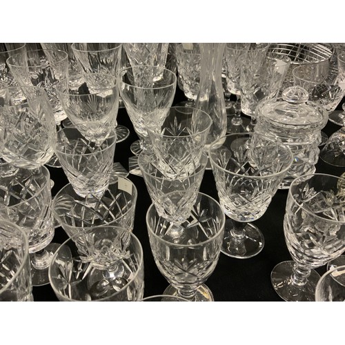 179 - Glass - cut glass including; spirit decanters, set of six Stuart glasses, five Waterford wine glasse... 