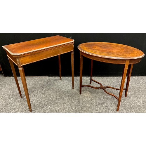 236 - An Edwardian, early 19th century style, mahogany fold over card table, rectangular top with canted c... 