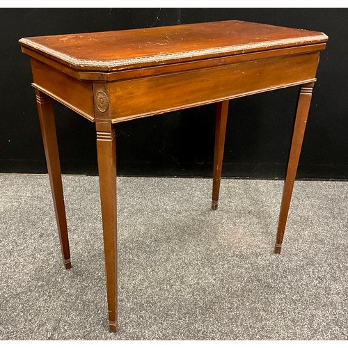 236 - An Edwardian, early 19th century style, mahogany fold over card table, rectangular top with canted c... 