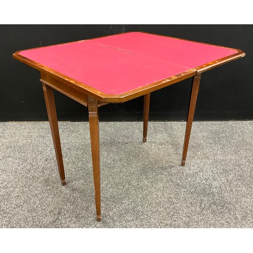 236 - An Edwardian, early 19th century style, mahogany fold over card table, rectangular top with canted c... 