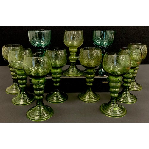 103 - A set of eight Green German Roemer glasses, and another similar;  two turquoise green Roemer or Hock... 